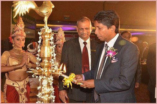 RamaDBK representative lighting a ceremonial lamp